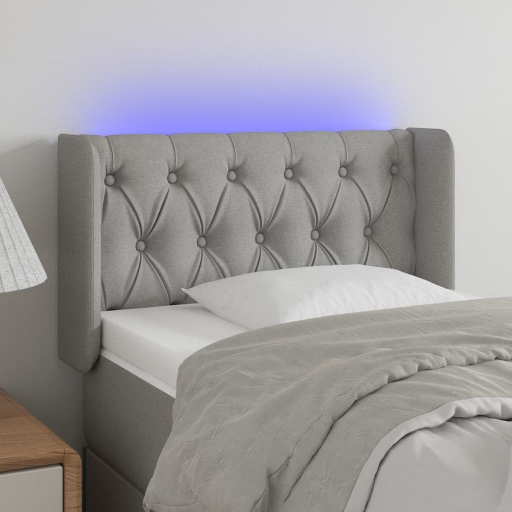 Vidaxl Čelo postele s LED bledosivé 83x16x78/88 cm látka